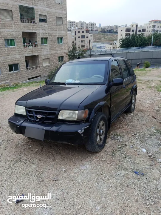 كيا سبورتج 2001 لون اسود للبيع