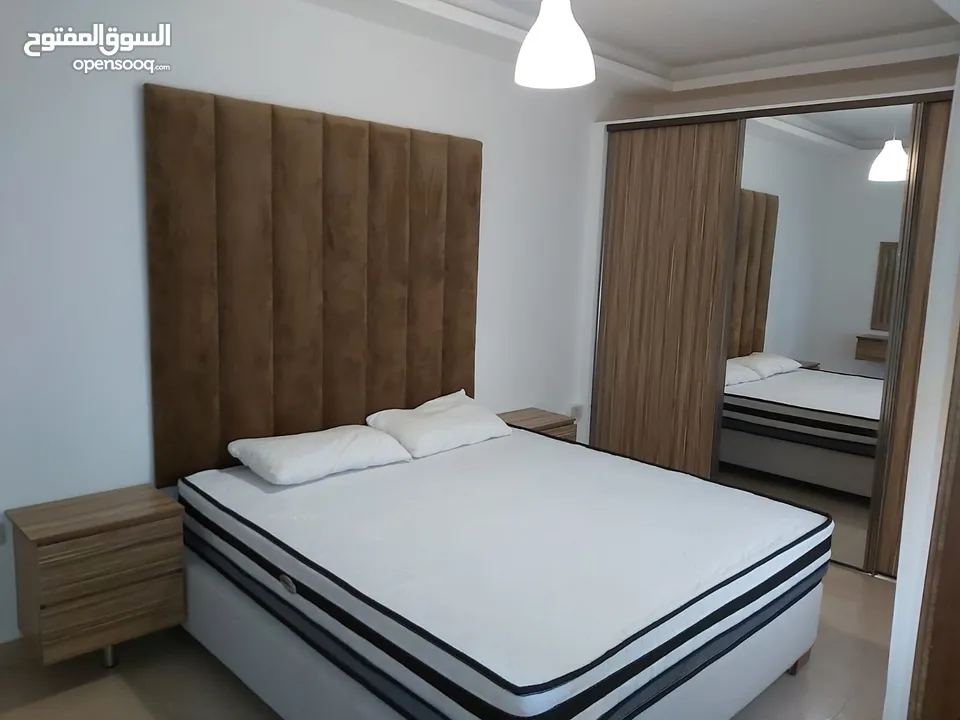 شقة فاخرة للايجار غرفتين نوم في شارع المدينة المنورة قرب مطعم ورد