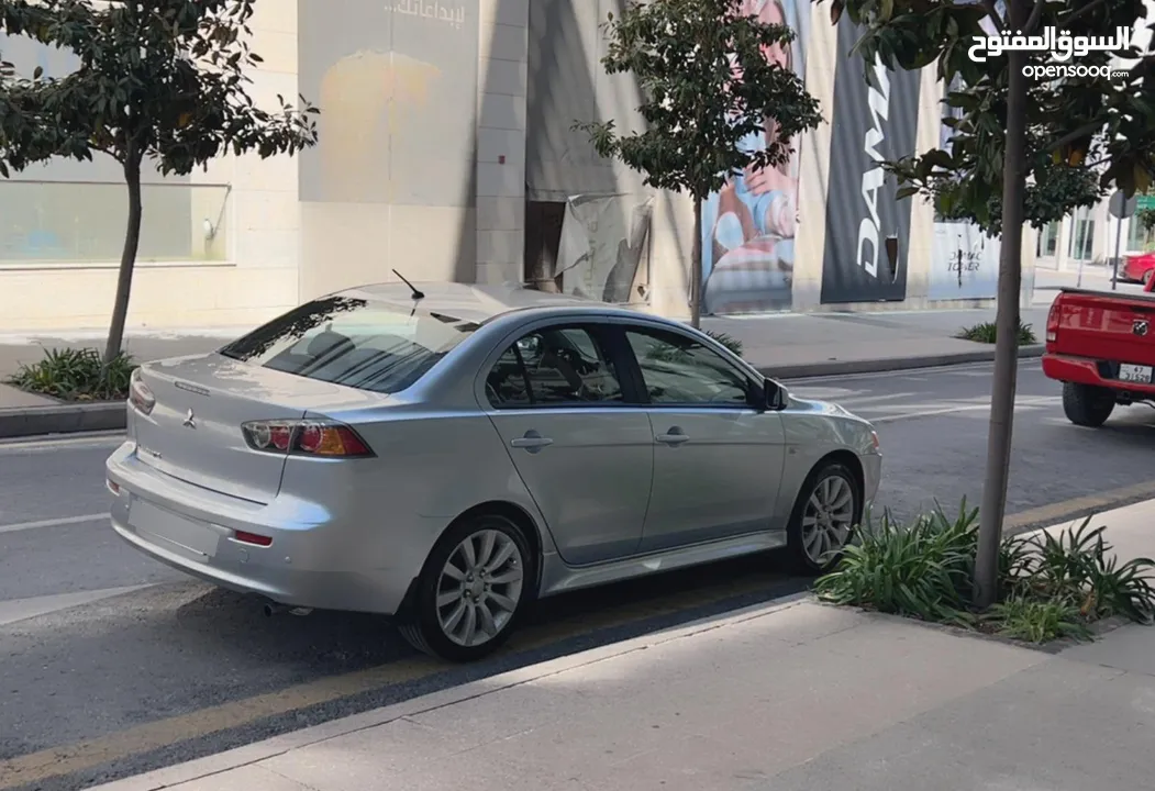 لانسر  فحص كامل 7جيد1.6محرك اقتصادي جير أوتوماتيك كت رالي ارت ياباني اصلي كراسي جلد وقماش الياباني