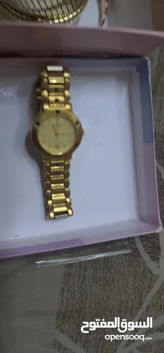 used watch and bracelet