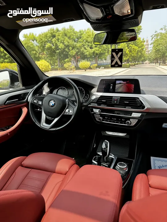 BMW X3 2021رمادي داخل احمر
