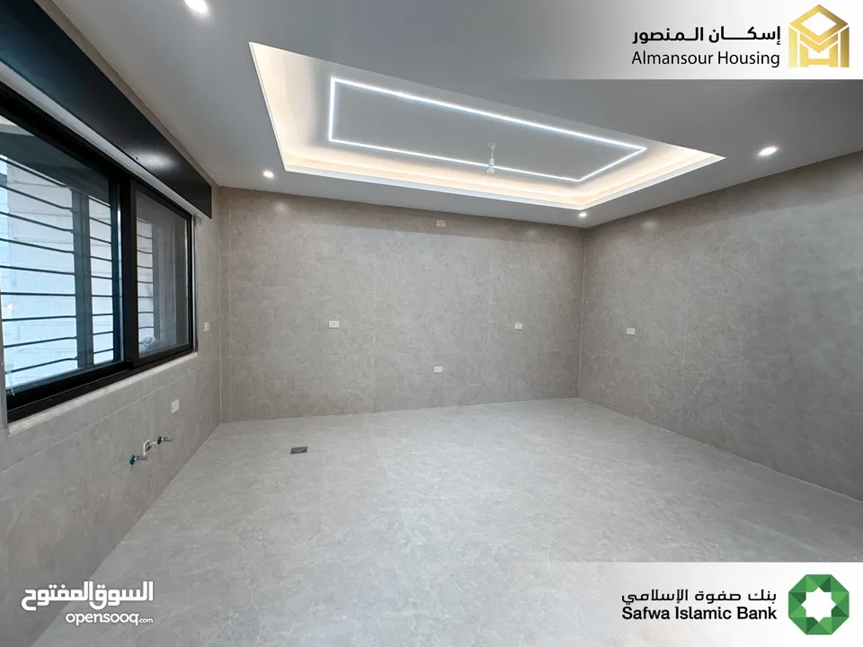 شقة ارضي معلق 190م2 يسار فاخرة للبيع في منطقة مكة مول/ مشروع مكة مول 5 (1/2) ( إسكان المنصور )