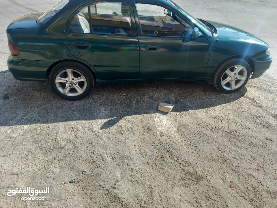 جنط مع كوشوك للبيع 15رراغي بعيد نظيف