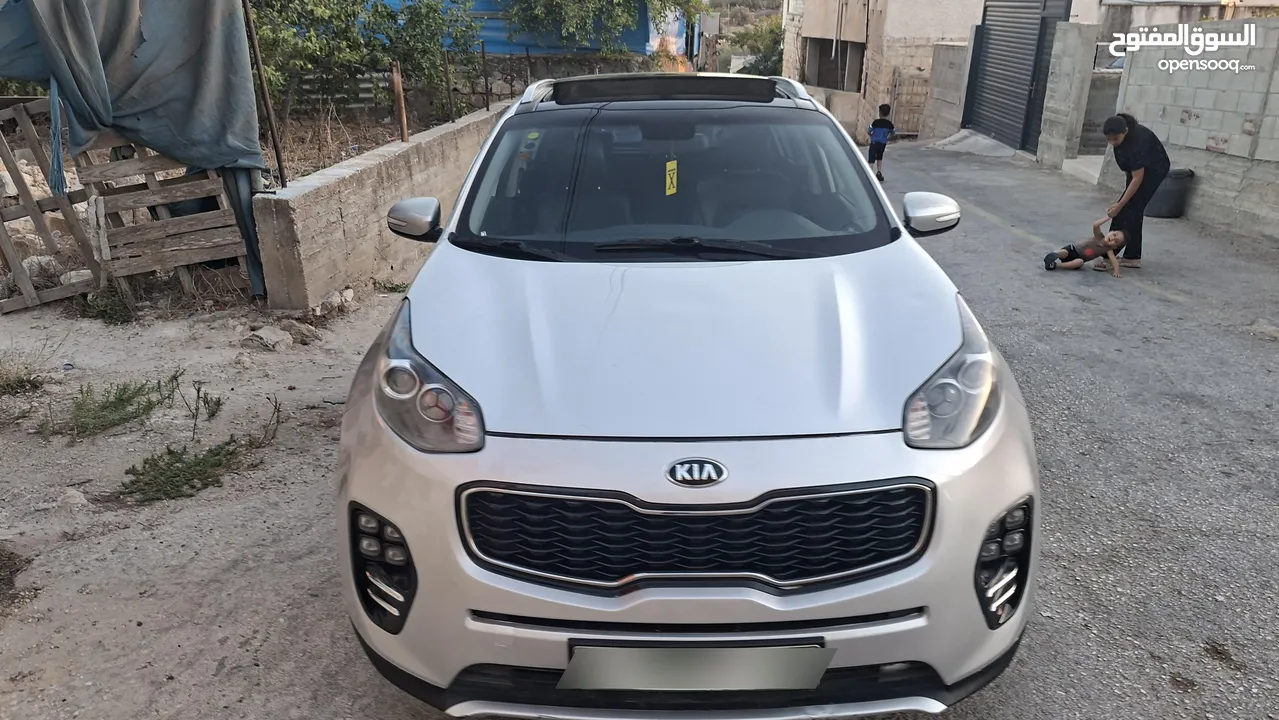 كيا سبورتج جتي لاين 2016ماتور2000ديزل فلل اضافات مع فتحة سقف بنوراما  بسعر حررررق كاش دهان شركة