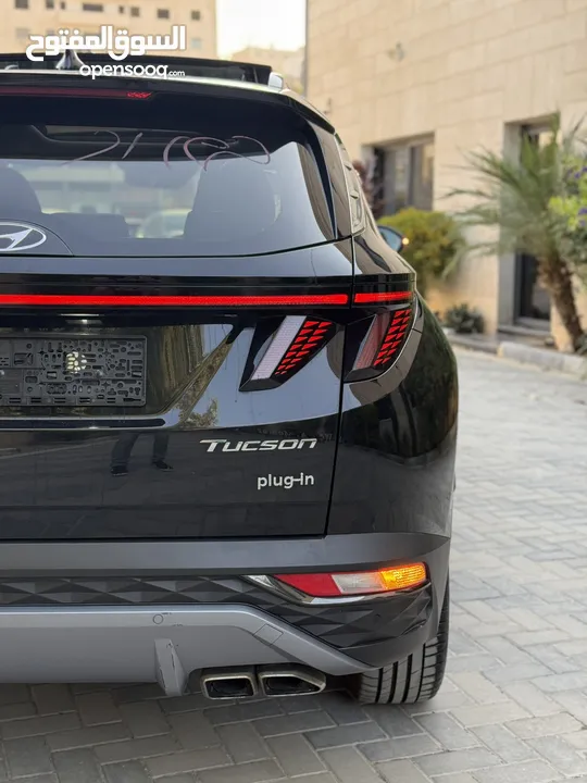 هونداي توسان ترخيص 2022 محرك 1600 هايبرد plug in/يقطع على الشحنه 65 كيلو متر  271 حصان