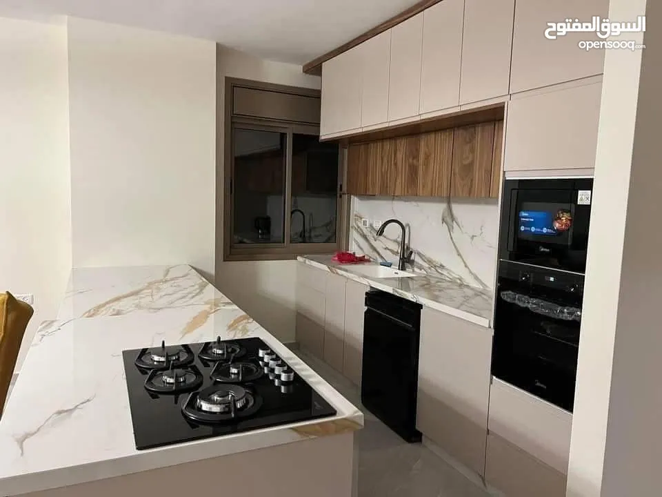 شقه فارغة للايجار في عبن منجد قرب سوبرماركت بغداد لم تسكن من قبل