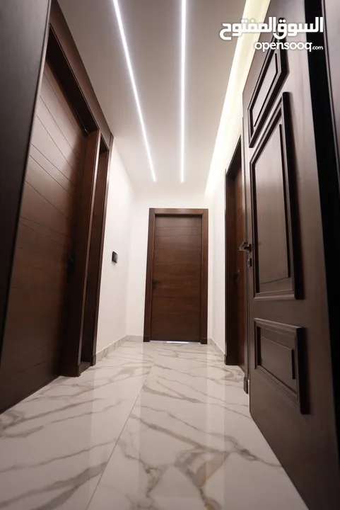 شقه مميزه للبيع بعد المدارس العالميه طريق المطار مباشره بسعر مغري تشطيب سوبر ديلوكس