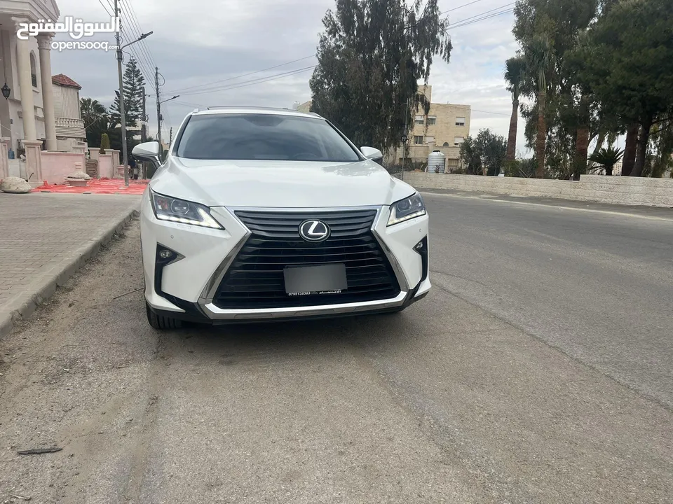 لكزس RX450hL موديل 2018 لون ابيض لؤلؤي وارد وصيانه الوكاله اعلى تصنيف من فئتها