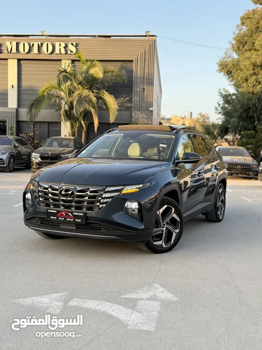 هونداي توسان ترخيص 2022 محرك 1600 هايبرد plug in/يقطع على الشحنه 65 كيلو متر  271 حصان