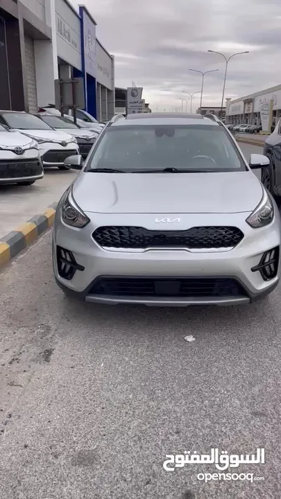 كيا نيرو هايبرد فل كامل أعلى صنف تورنج موديل 2021 عداد 60الف  فحص كامل 7جيد