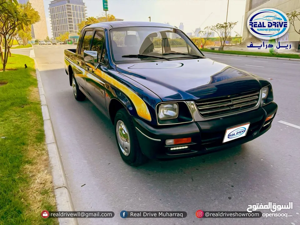 MISTUBISHI L200  DOUBLE CABIN   Year-1999  Engine-2.4L  4 Cylinder   Colour-blue  Odo meter-193k