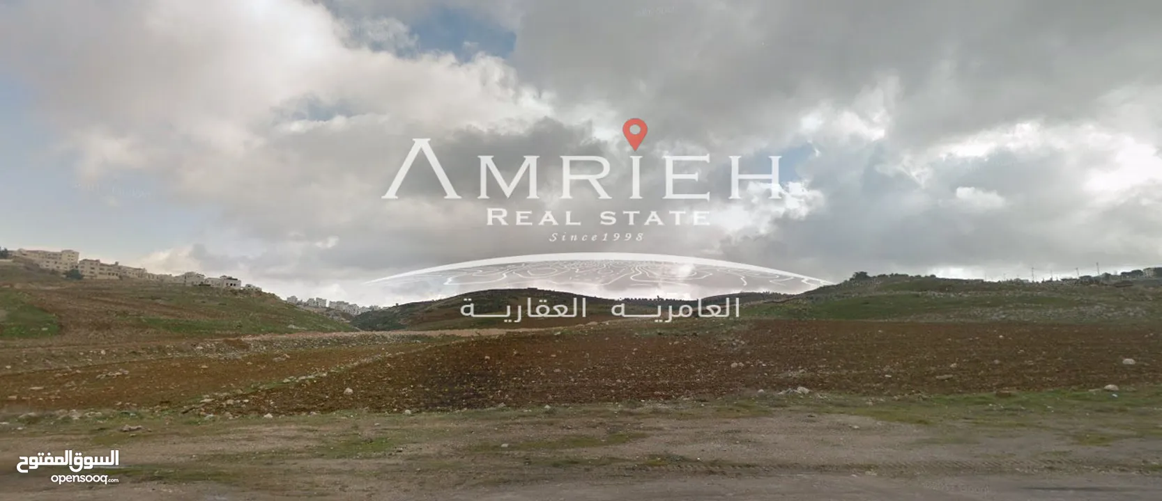 ارض 804 م للبيع في رجم عميش / اطلاله مميزه على كاريدور عبدون ( موقع مميز ) .