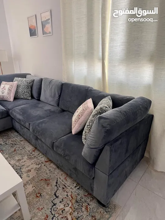 L shape sofa , good condition , new cover