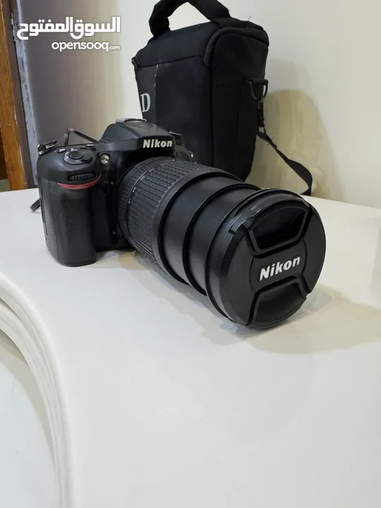 كاميرا نيكون d7100 الشتر 4k فقط  نظيفة جداً مع جميع ملحقاتها