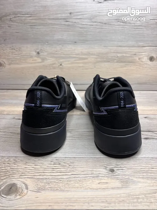 Adidas black shoes