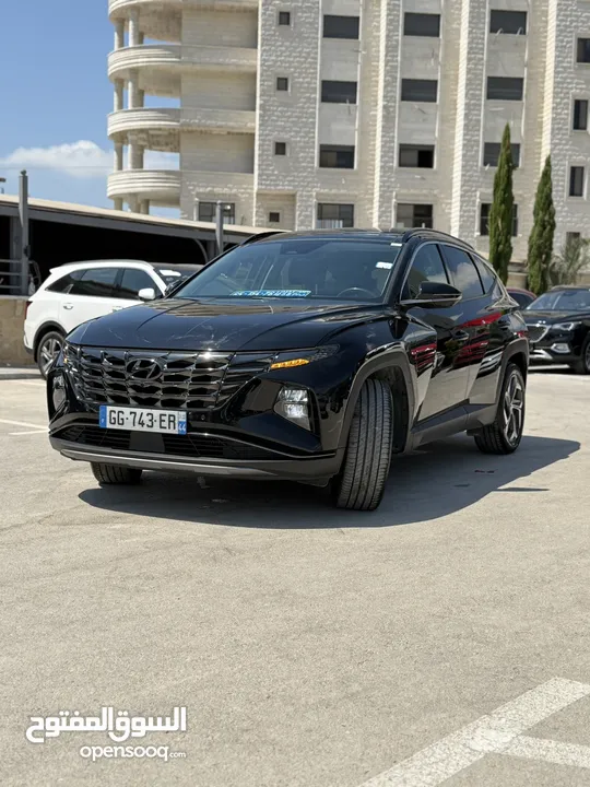 هونداي توسان ترخيص 2022 محرك 1600 هايبرد plug in/يقطع على الشحنه 52 كيلو متر