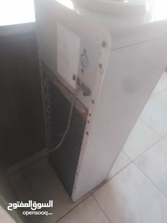 كولر ماء و فرامة لحمة مستعمل وبحالة جديدة