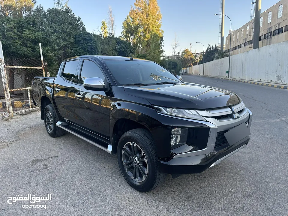 ميتسوبيشي L200 سبورتيرو موديل 2022 وارد الشركة أعلى صنف مع ديفلوك مالك واحد للبيع