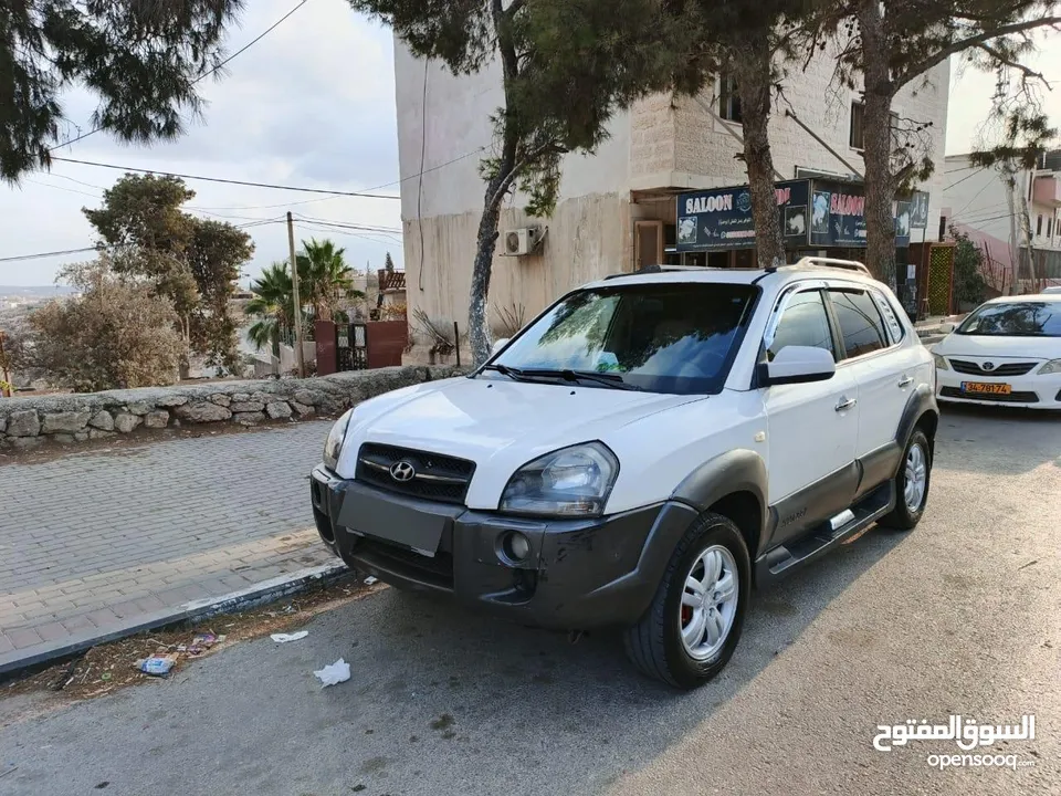 جب توسان 2005بصلاة على النبي الجب بوضعية ممتازة قوة متور 2000 +16صباب مو 20 متور وجير ممتاز