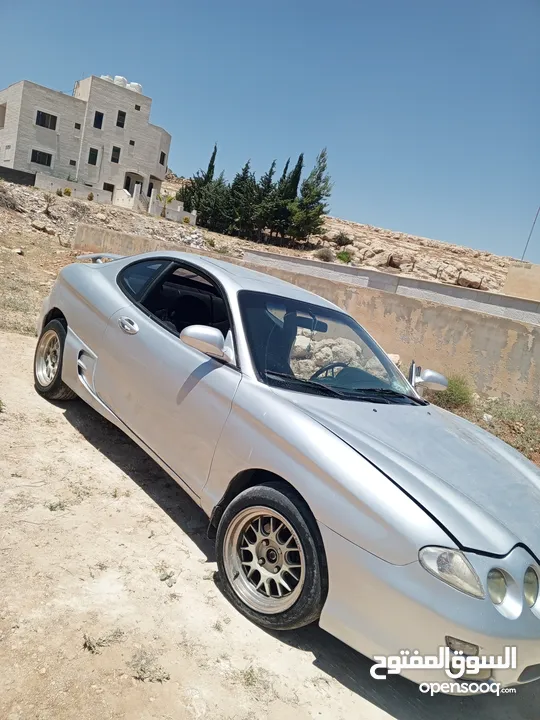 هونداي تيبرون 2000,