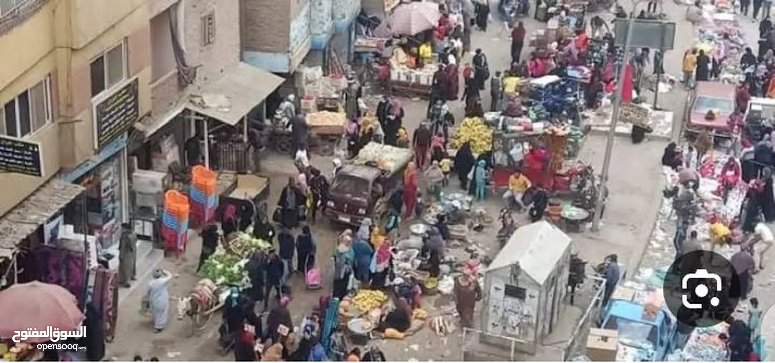 محل تجارى متفرع  من ميدان الجيزة