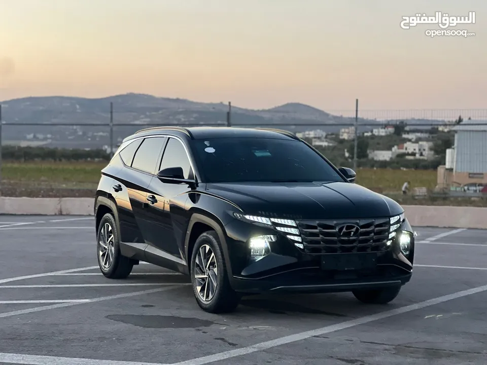 هونداي توسان/2022 فل الفل بدون فتحة سقف  2x4 ///240Hp بنزين + كهرباء  ( Haybrid) 1600cc