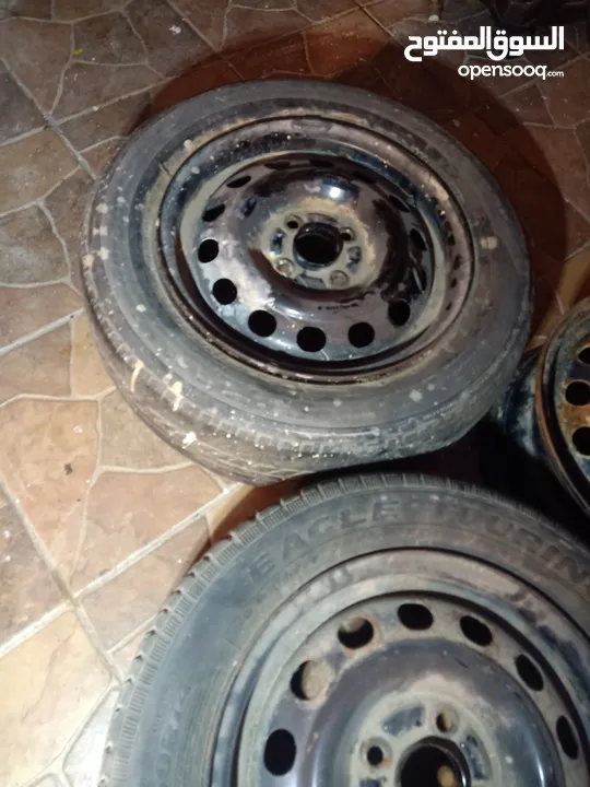 جنط لانسر حديد 14 برغي بعيد عدد 3