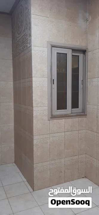 بيت إسكان مع بناية من دورين،كل دور شقة مستقلة بمدخل مستقل،مدخوله الشهري من الشقق