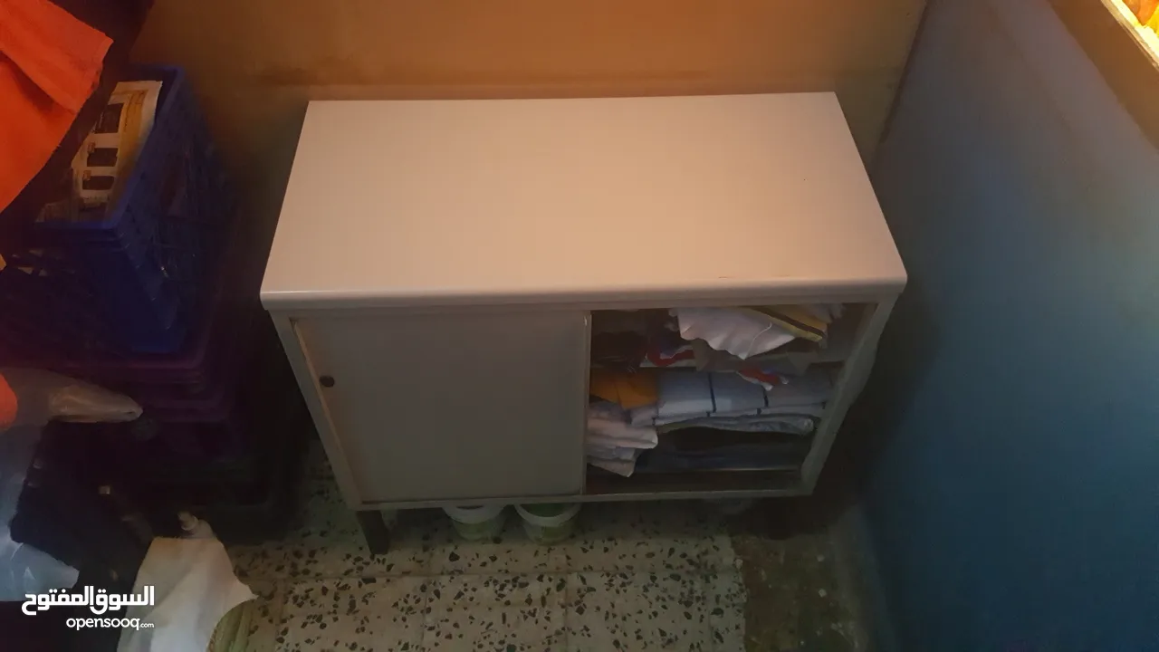 Metal cabinet with granite top going very cheap