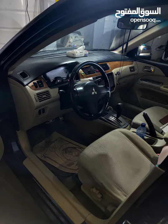 متسوبيشي لانسر GLX 2007 1600 cc وارد الخليج الكويت جميع الإضافات بإستثناء الفتحه وجنط إضافي.