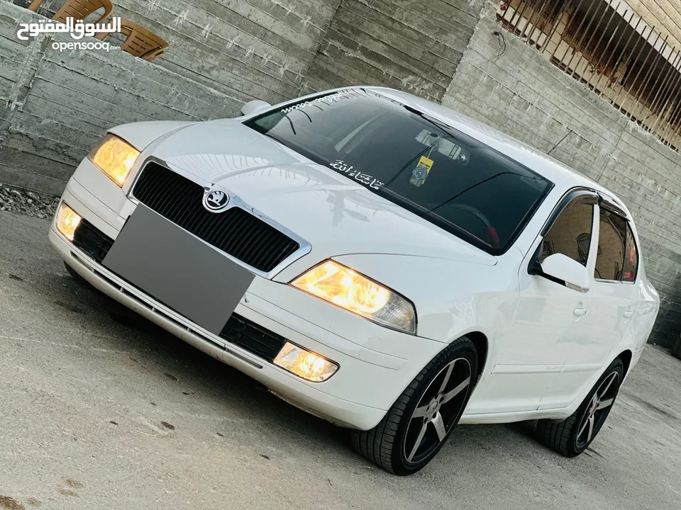 سكودا نيو 2006 دهان جديد  فحص ممتاز وتخلو من القص والضربات هيئه جديد فرش جلد  شاشه اندرو