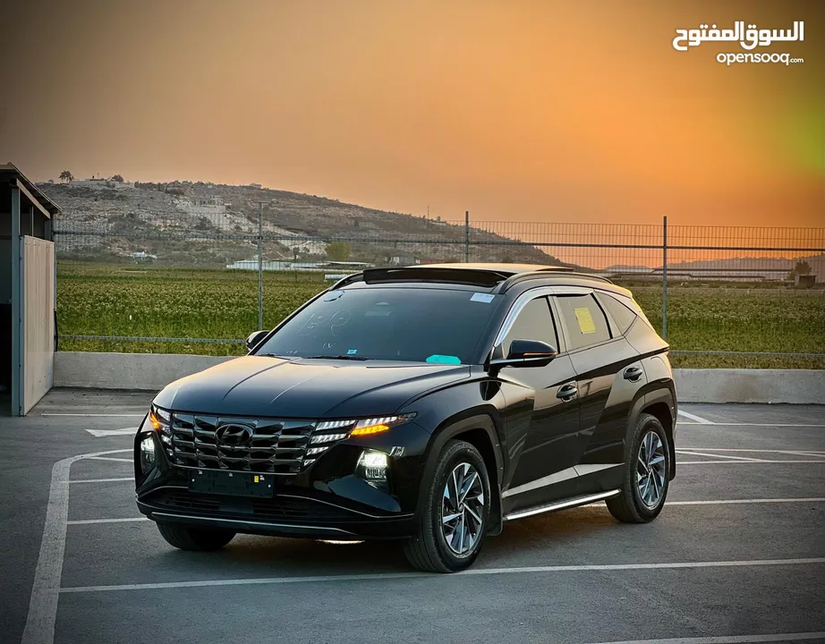 هونداي توسان/2022 فل الفل فتحة سقف بانوراما  2x4 ///240Hp بنزين + كهرباء  ( Haybrid) 1600cc