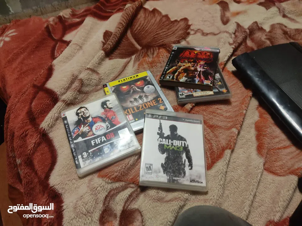 بليستيشن 3سوبر سلم  ممتازة مستعملة مع اقراص هارد500 جيجا وجود اوف ويرفيفا  كول اوف ديوتي 2  تيكين كي
