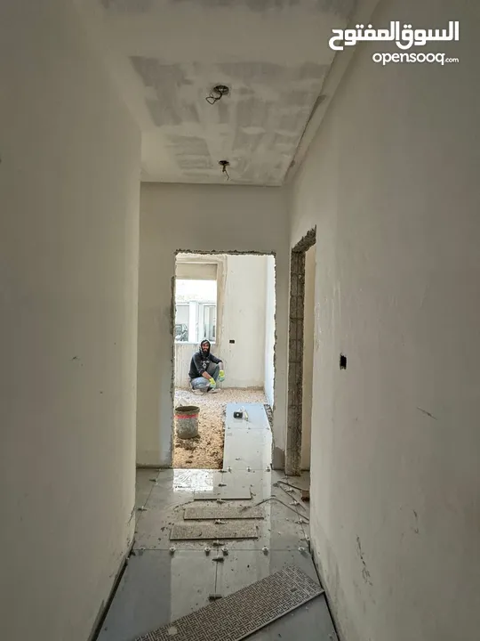 شقة طابق رابع مع روف للبيع في اربد مجمع عمان الجديد بمساحة185