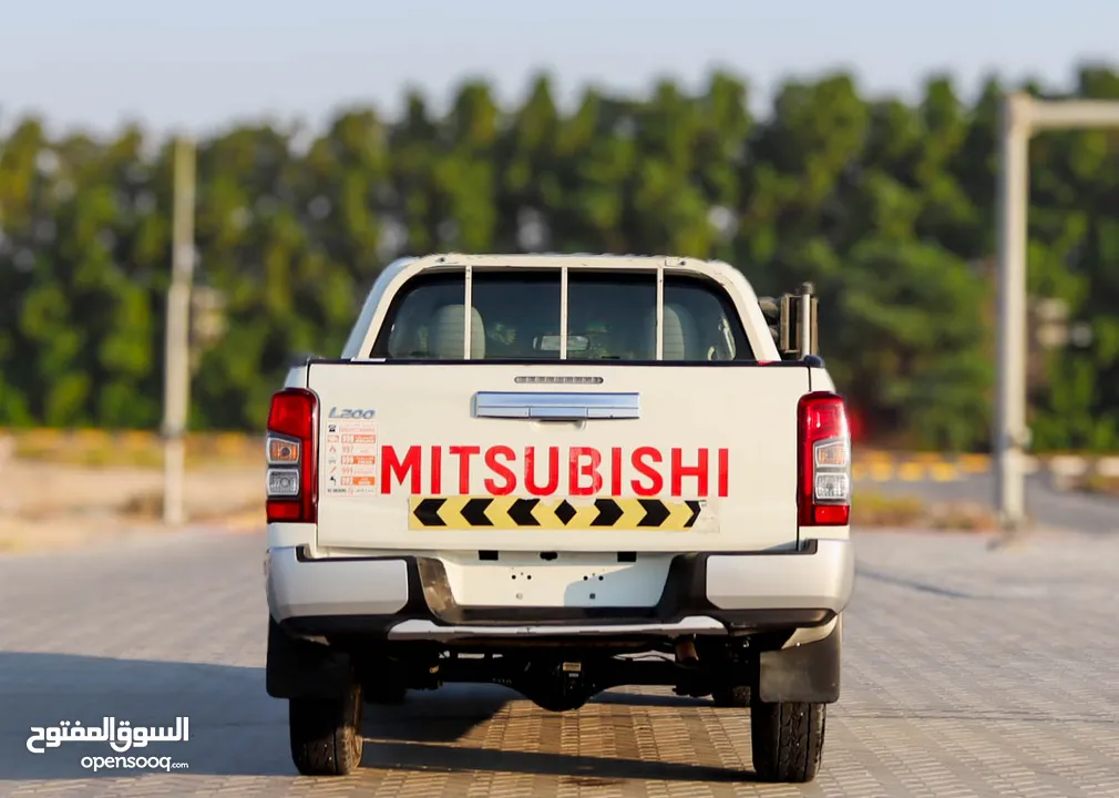 Mitsubishi L200 2.4 L 2021 GCC accident free in excellent condition 1303 P.M