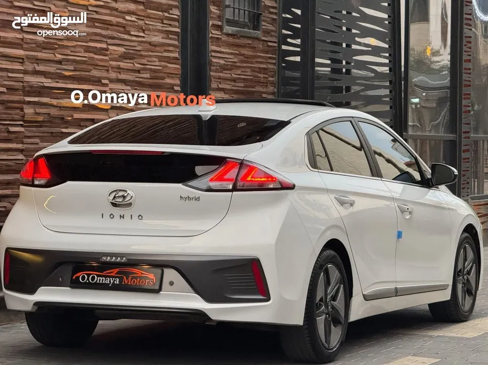 هيونداي أيونيك هايبرد مع فتحة سقف عداد قليل  بطارية مكفولة حتى 2028 و أعلى فئة إضافات و بسعر آلعرض