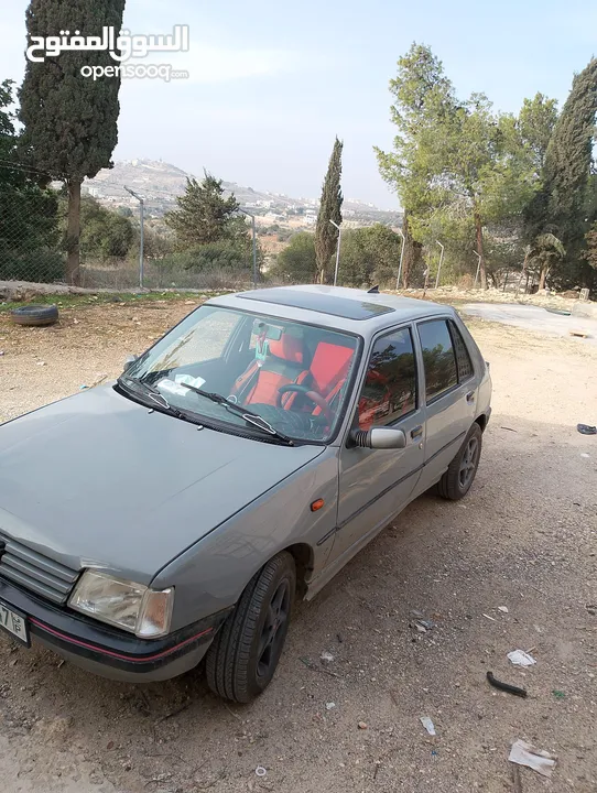 بيجو 205 للبيع السيارة جير عادي مش ناقصها برغي زي ما هي بالصور تماماً قانوني ومرخص ومأمن ساري مفعول