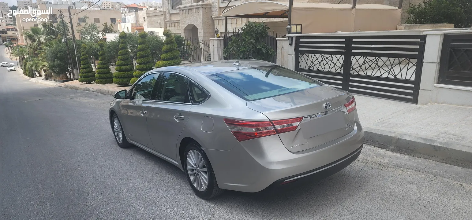 تويوتا افالون هايبرد 2015 فل كامل وأعلى صنف Limited وارد و مواصفات أمريكيه مالك واحد فحص كامل