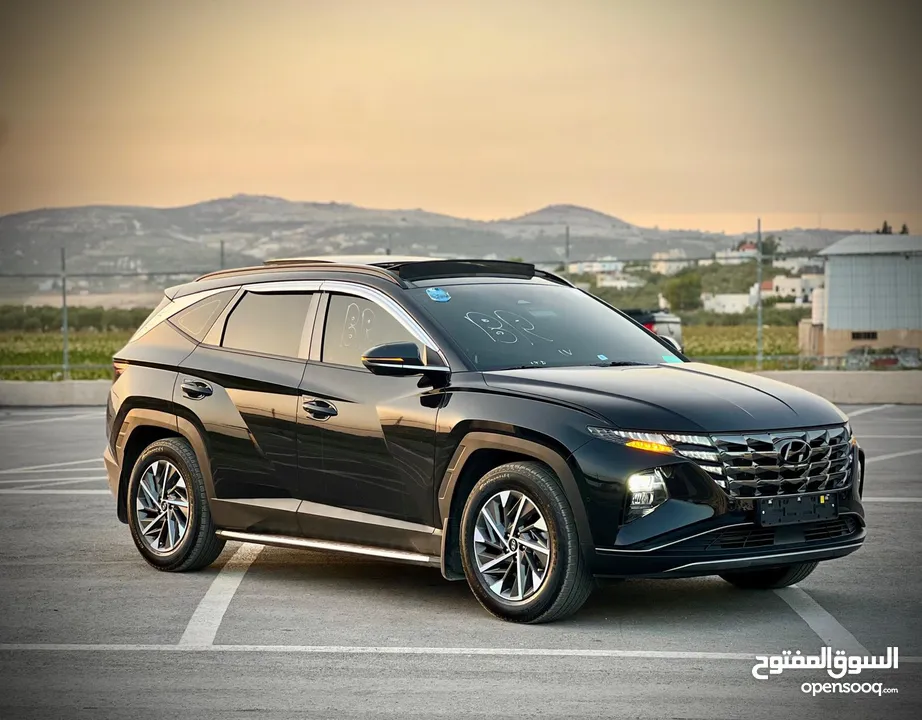 هونداي توسان/2022 فل الفل فتحة سقف بانوراما  2x4 ///240Hp بنزين + كهرباء  ( Haybrid) 1600cc