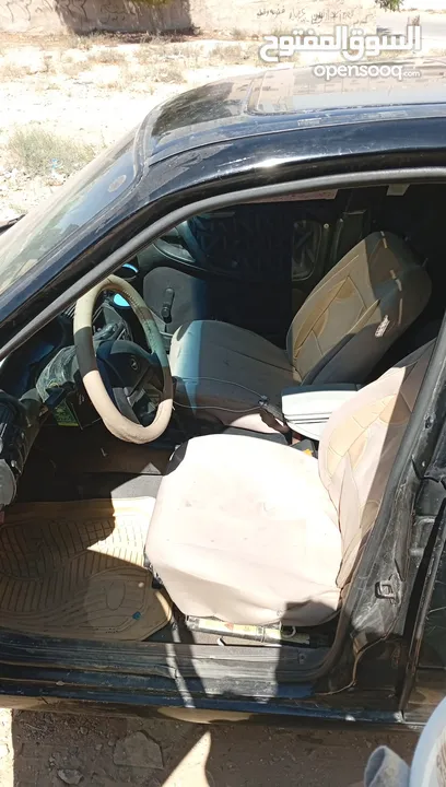 اوبل استرا موديل 95 مرخصة لشهر 3/19/2026 ماتور 16 قير عادي فتحه بسقف