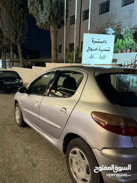 بيجو 2004 بحاله ممتازه بسعر مغري توماتيك ترخيص سنه كامله لا تحتاج لاي شيء نهائيا دهان جديد