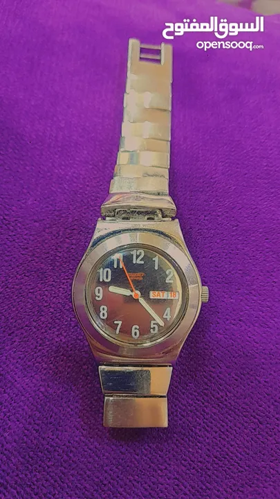 > ساعة Swatch Irony أصلية للبيع  ستانلس ستيل كاملة عرض يوم وتاريخ مقاومة للماء   ( تحتاج فقط بطارية)