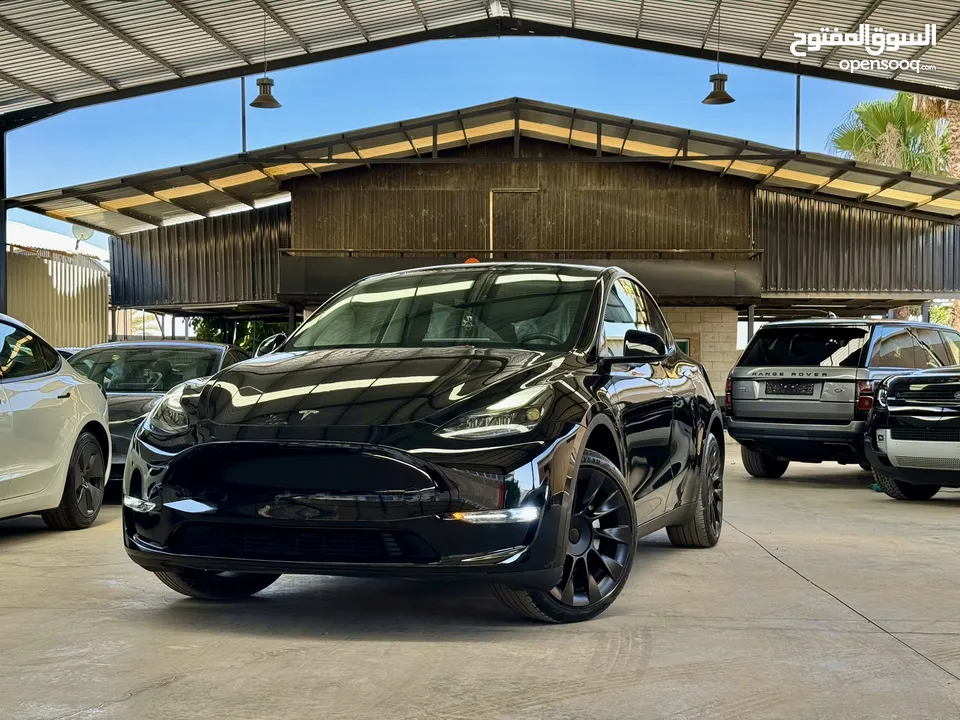 Tesla Model Y 2023 ( LONG RANGE DUAL MOTOR ) , 22 الف مايل ، فحص كامل ، ايرباج مغلق
