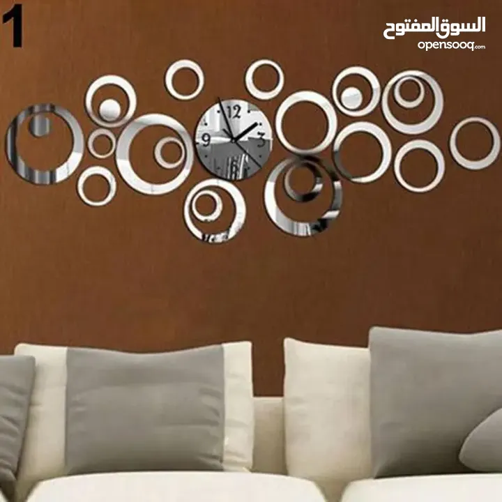 ساعه  حائط  ضخمه ديكور  ساعة  لون ذهبي و اسود و فضي مرآه و بني  حجمين