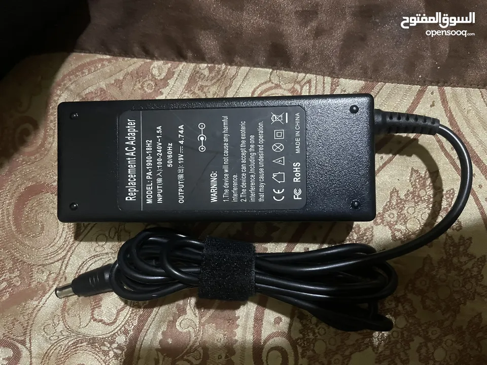 شاحن لابتوب جديد ابرة بزبط للسامسونج كوبي نخب اول  وبطاريه اتش بي نحيفه مستعمله