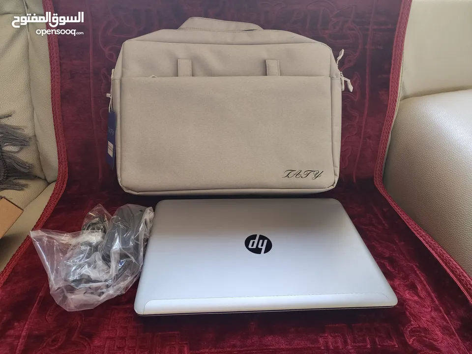 اجهزت hp i7 2.10GHz 500 H.D 8GB Ram  مع شنته جديده وشاحن بطاريه جداد  شاشات لمس
