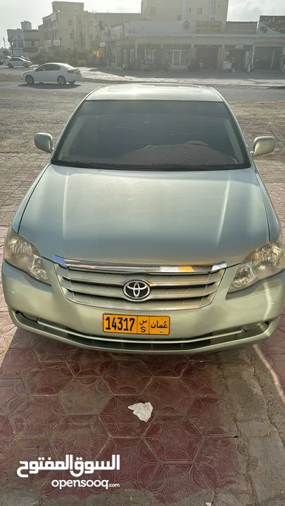 Toyota Avalon urgent sale going to contry