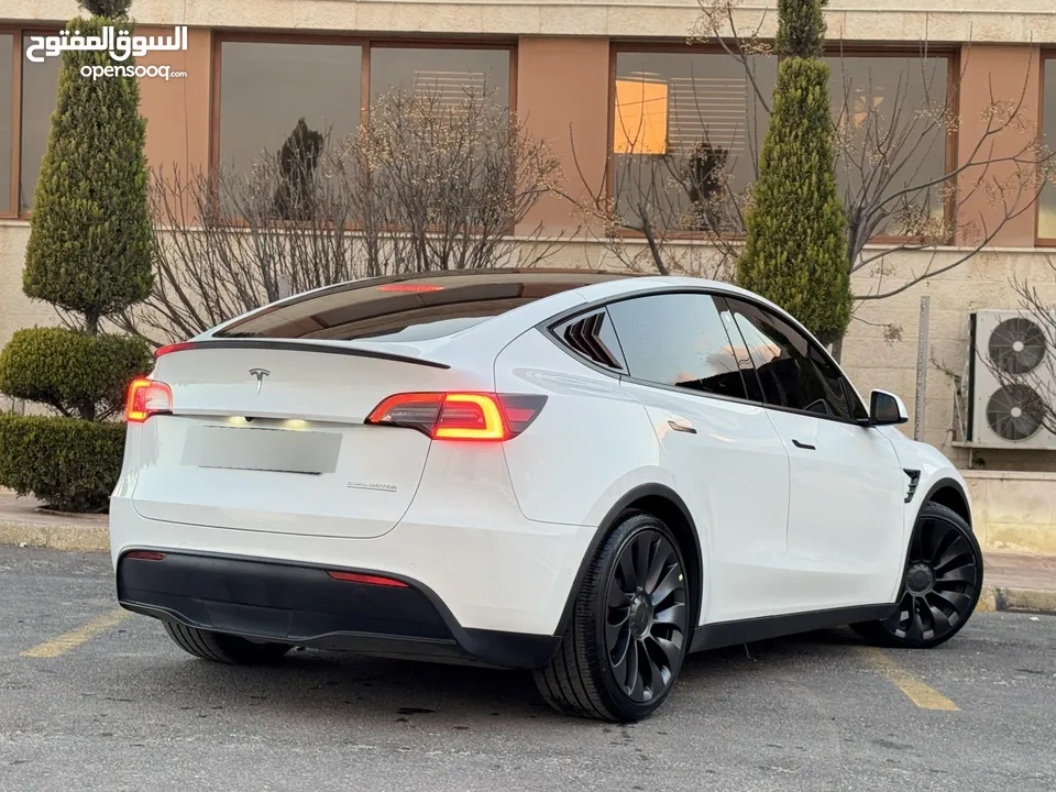 تيسلا موديل y 2022 فل كامل اعلا فئه بيرفورمنس  فحص كامل جمرك جديد  Tesla model Y 2022 performance