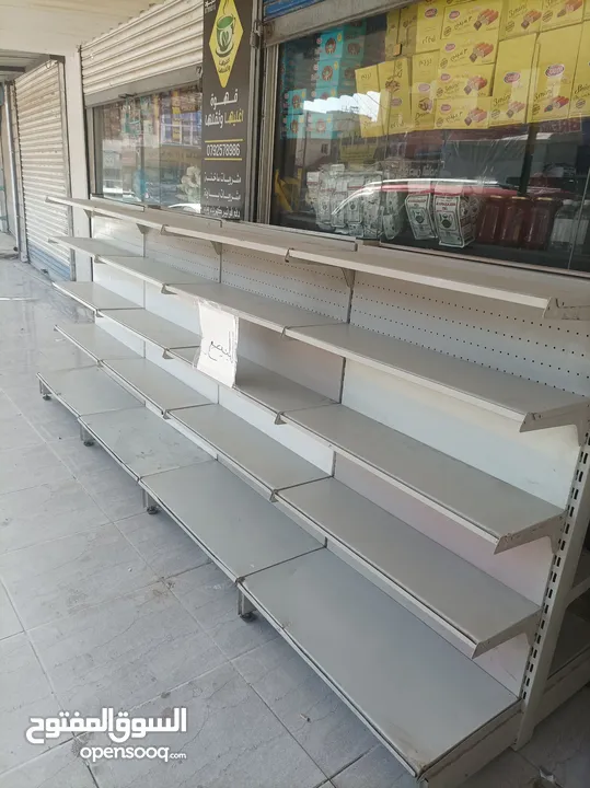 ستاند بضاعه وسطي متعدد الاستعمالات