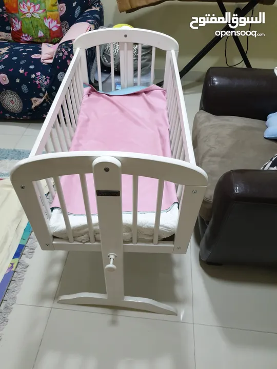 Used wooden baby cradle for sale - Juniors Brand